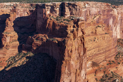 Red colored stone canyon and buttes at canyon de chelly national monument in arizona