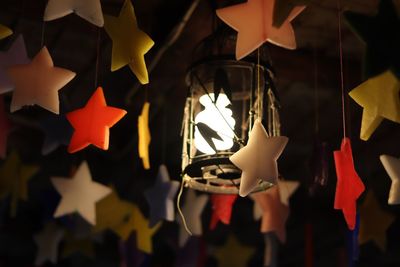 Close-up of decoration hanging indoors