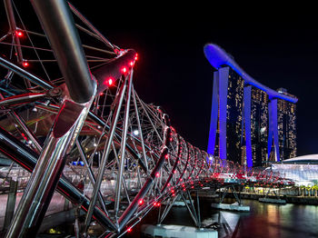 Illuminated ferris wheel at night