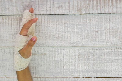 Shadow of woman hand on wall