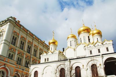 Low angle view of cathedral against cloudy sky