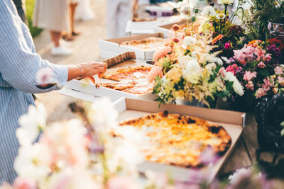 Midsection of man preparing food