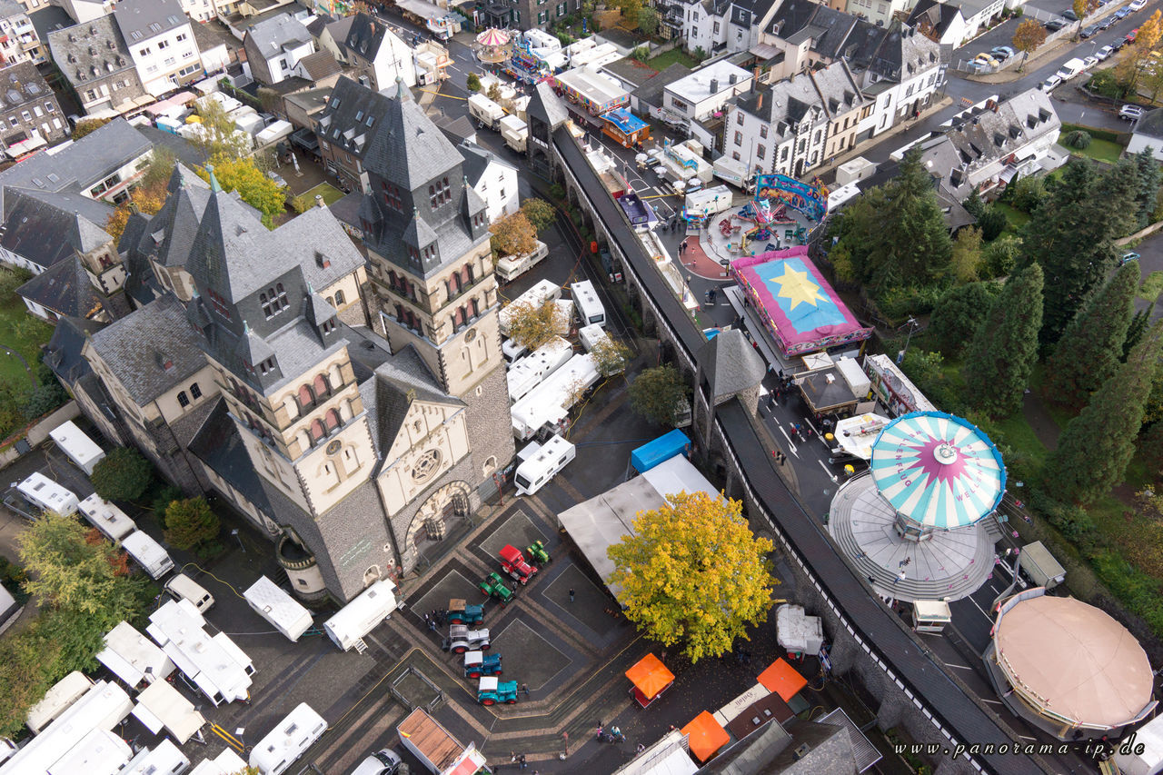 building exterior, architecture, high angle view, built structure, city, cityscape, crowded, residential district, residential building, tree, aerial view, residential structure, day, roof, outdoors, city life, no people, elevated view, house, town