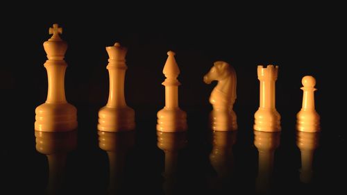 Close-up of chess against black background