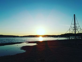 Scenic view of sunset over calm sea