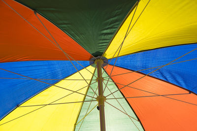 Low angle view of multi colored umbrella