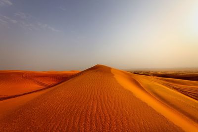 Scenic view of desert against sky