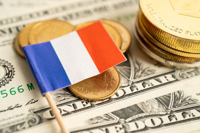 Stack of coins money with france flag, finance banking concept.