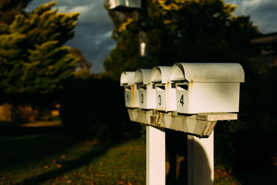 Close-up of mailbox on field