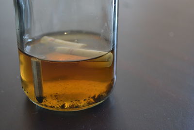 Close-up of glass of jar on table