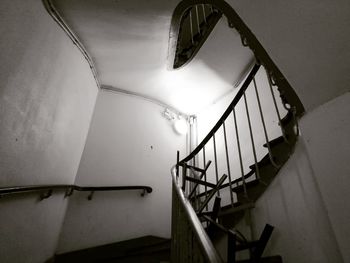 Low angle view of spiral staircase in building