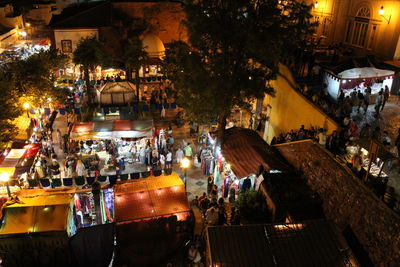 High angle view of crowd on street at night