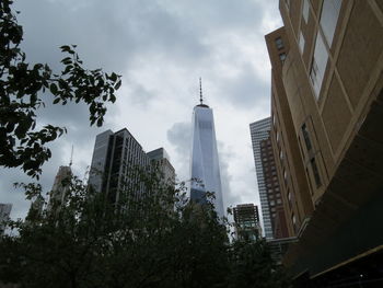 Low angle view of skyscrapers against sky