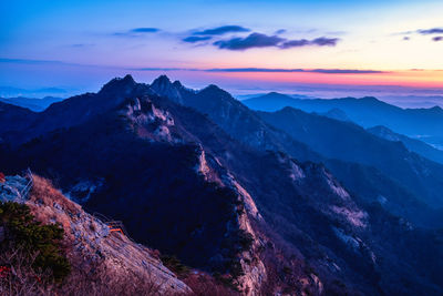 Scenic view of mountains against sky during sunset