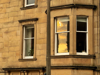 Low angle view of window of old building