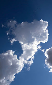 Low angle view of clouds in blue sky