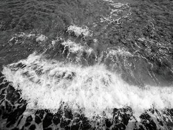 High angle view of waves in sea