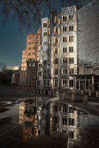 Buildings against sky in city