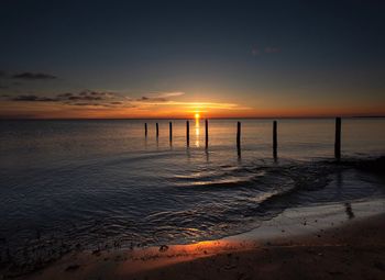 Scenic view of sea against sky during sunset