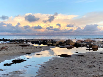 Scenic view of sea against sky during sunset
