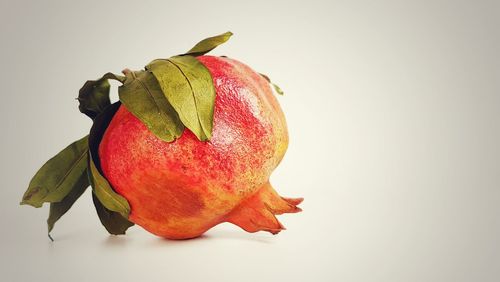 Close-up of strawberry against white background