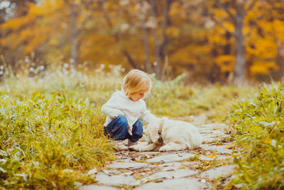 Man with dog in autumn