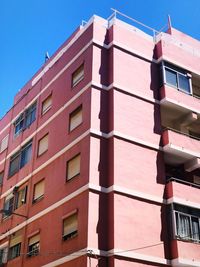 Apartment building against clear sky