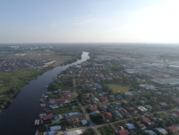 High angle view of buildings in city against sky