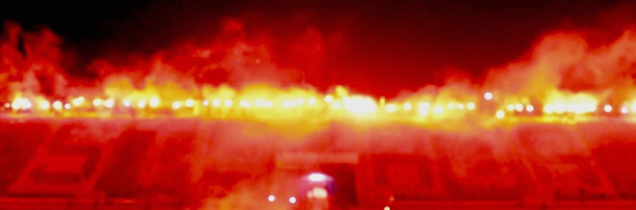 red, illuminated, multi colored, long exposure, motion, night, blurred motion, orange color, in a row, selective focus, no people, sky, indoors, focus on foreground, built structure, close-up, glass - material, light - natural phenomenon, smoke - physical structure