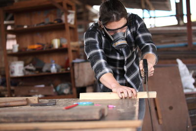 Carpenter working at workshop