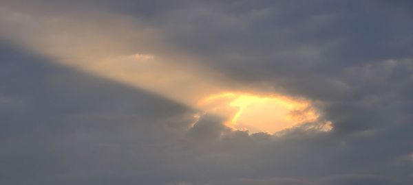 Low angle view of clouds in sky during sunset