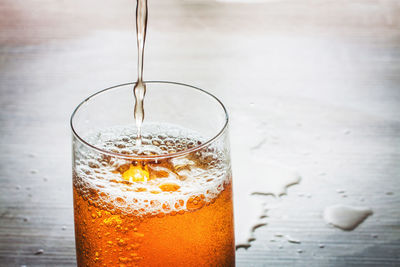 Close-up of drink in glass on table