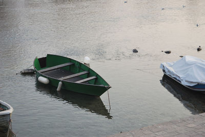 Boats moored on sea