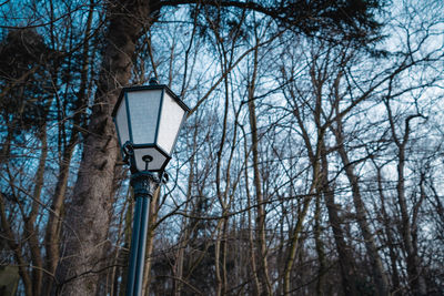 Low angle view of street light against sky