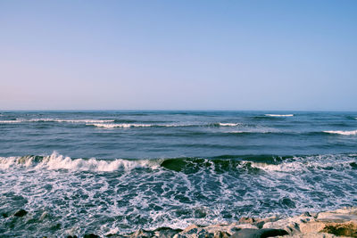 Scenic view of caspian sea against clear sky