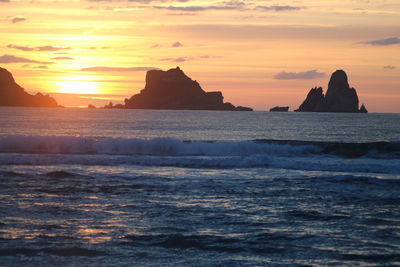 Scenic view of sea against sky during sunset