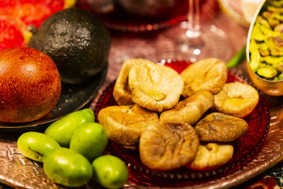 Close-up of fruits in plate on table