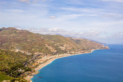 High angle view of bay against sky