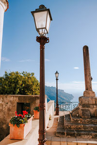 Low angle view of street light against clear sky