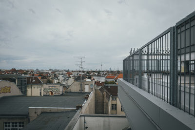 High angle view of bridge and buildings against sky