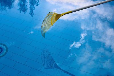 Close-up of swimming pool against blue sky