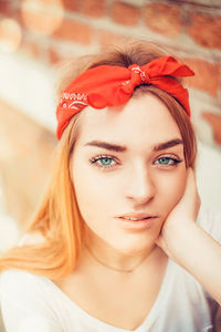 Close-up portrait of woman at home