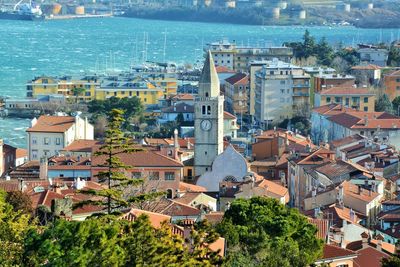 High angle view of town by sea