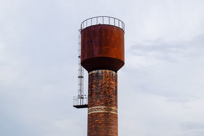 Low angle view of water tower against sky