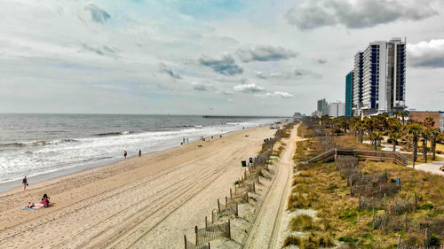 Scenic view of beach against sky