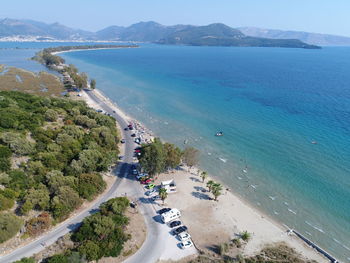 High angle view of road by sea against sky