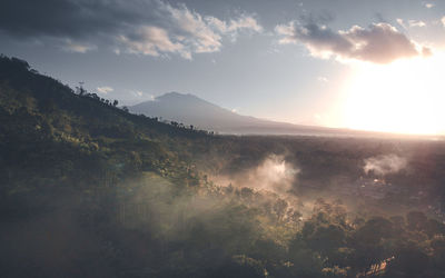 Scenic view of mountains against sky during sunset