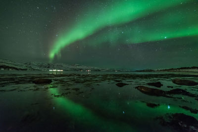 Scenic view of sea against sky at night