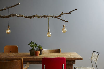 Decor over table against gray wall at home