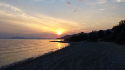 Scenic view of sunset over sea